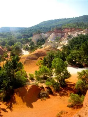 a view of a canyon with trees and rocks at Maison de campagne La Teranga au coeur du Luberon in Apt