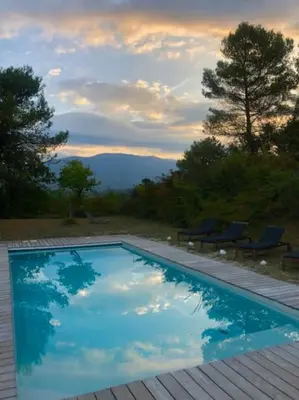 a swimming pool with a view of the mountains at Mazet avec piscine, vue Ventoux in Crillon-le-Brave