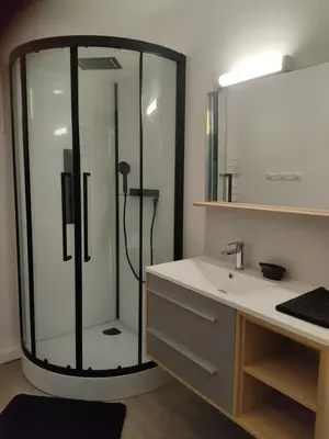a bathroom with a shower and a white sink at Villa dans la forêt provençale in Jouques