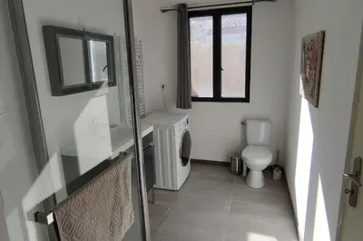 a bathroom with a sink and a toilet at Charmant studio indépendant dans la colline in Eyguières