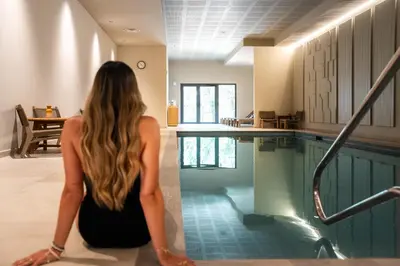 a woman sitting next to a swimming pool at Setclub Hôtel & Spa Aix-en-Provence in Aix-en-Provence