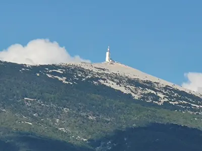 a white lighthouse on top of a mountain at Gîte au pied du mont ventoux in Bédoin