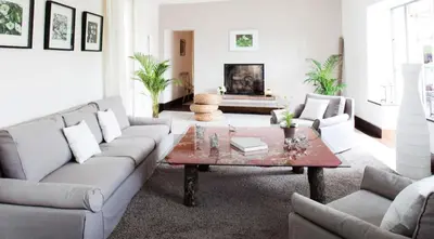 a living room with a couch and a coffee table at ELIA HOUSE in Goult