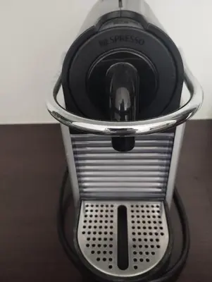 a dog is sitting in a toaster with its tongue at Studio Terrasse Privée Jardin Air conditionné in Aix-en-Provence