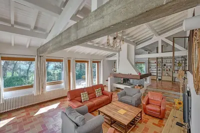a living room with a couch and a table at Grande villa avec piscine près d'Avignon - Jonquerettes in Jonquerettes