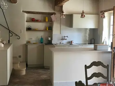 a kitchen with a sink and a counter top at Clos de l'Abba in Gordes
