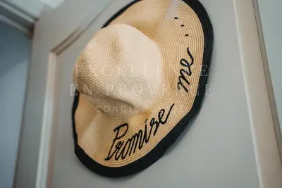 a hat hanging on a wall with the words familysearch at Mas de l'air in Noves