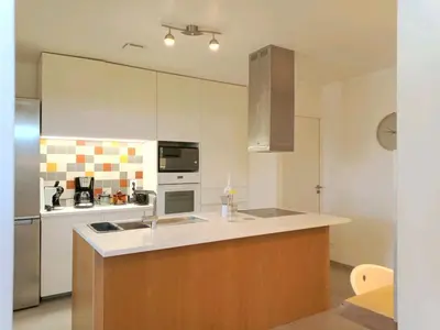 a kitchen with a sink and a counter top at Villa Lambesc Provence in Lambesc