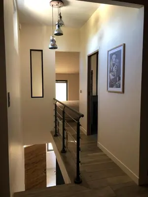 a staircase in a home with a stair case at L'Oustalet des Alpilles in Saint-Rémy-de-Provence