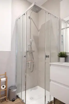 a shower with a glass enclosure in a bathroom at Studio rénové avec belle terrasse in Aix-en-Provence
