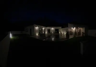 a house at night with lights in the dark at La Villa de Jéna in Mazan