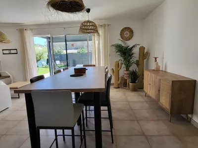 a dining room with a table and chairs at Pleasant detached villa with private swimming pool for 6 people in Lauris - Luberon. in Lauris