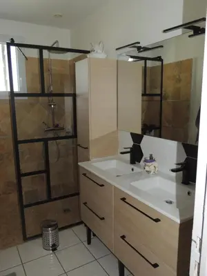 a bathroom with a sink and a shower at Villa au calme in Eyguières