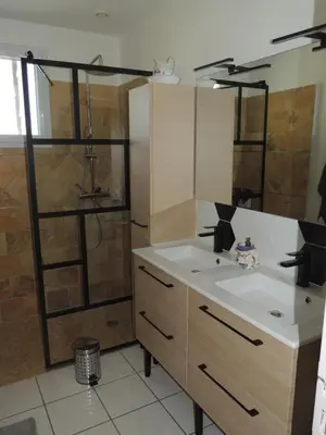 a bathroom with a sink and a shower at Villa au calme in Eyguières