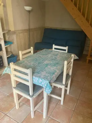 a small bedroom with a bunk bed and a ladder at gîte à Rustrel in Rustrel