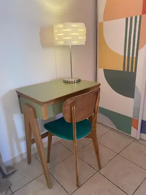 a desk with a chair and a lamp on it at Inspiration maison entière avec jardin in Pernes-les-Fontaines