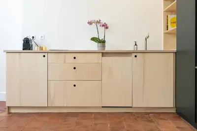 an island in a kitchen with a counter at Mistral126 in Aix-en-Provence