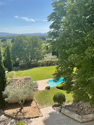 an aerial view of a garden with a swimming pool at Mas la Floreline in Cheval-Blanc