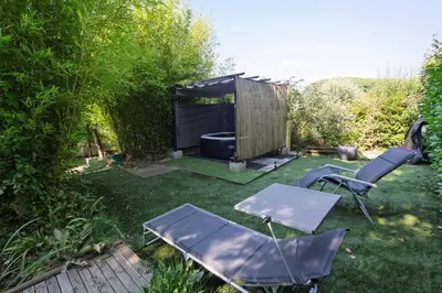 a group of chairs and a table in a yard at Studio dans le Luberon in Céreste