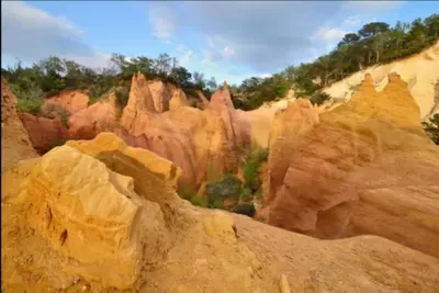 a view of a bunch of rock formations at Borie en Provence in Velleron