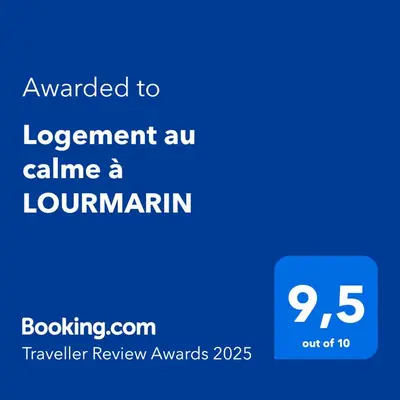 a blue sign with the text awarded to increment au claim a lawnaran at Logement au calme à LOURMARIN in Lourmarin