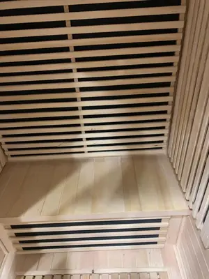 a ceiling with wooden blinds in a room at Suite avec sauna in Pertuis