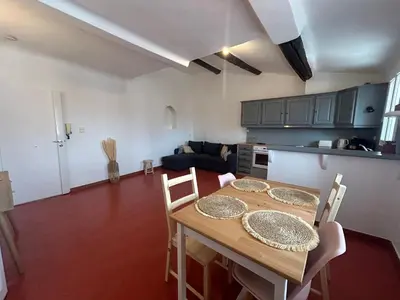 a kitchen counter with a coffee maker and a toaster at Namasté in Aix-en-Provence