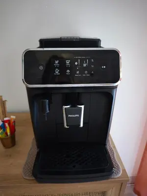 a black coffee maker sitting on top of a table at Chambre chez l'habitant à Pernes les Fontaines in Pernes-les-Fontaines