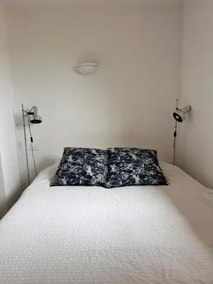a bedroom with a bed with two pillows on it at Casa Lub in Apt
