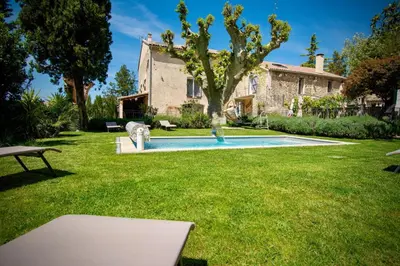 a house with a swimming pool in the yard at Valentins cottage Moulin de Tartay Avignon in Avignon