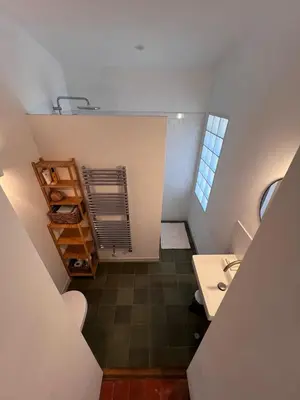 a small room with a desk and a table at Bergerie in Montjustin