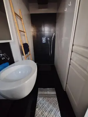a bathroom with a white sink and a shower at Chambre d'hôtes privée et indépendante avec piscine in Salon-de-Provence