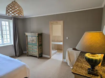 a bathroom with a shower and a toilet and a sink at Bastide Hedone en Luberon in Apt