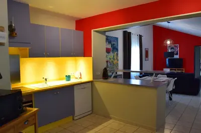 a kitchen with a sink and a counter top at Moulin des Gypses Gîte l'Oliveraie, Ventoux in Mormoiron