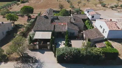 an aerial view of a house with a yard at Mas Naste in Eygalières
