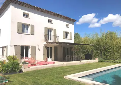 a house with a swimming pool in front of it at Hope, villa à Aix en Provence in Aix-en-Provence