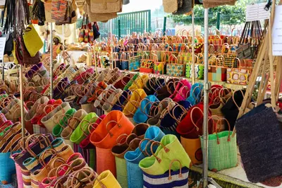 a market with many different types of shoes on display at La Bastide au Ventoux in Bédoin