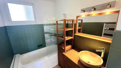 a bathroom with a toilet and a sink and a shower at Villa la Farigoule in Carpentras