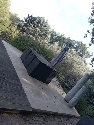 a bench sitting on top of a roof at maisonnette provençale piscine le petit colibri in Les Cordiers