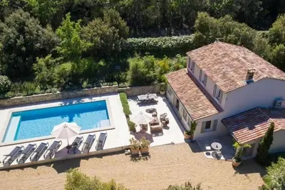 an aerial view of a house with a swimming pool at Les Blayons - Exclusive Pool Villa Stunning View in Bonnieux