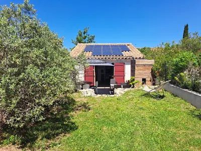 a house with solar panels on the roof at Gîte Le Dodo in Lançon-Provence