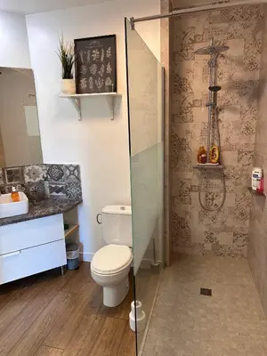 a bathroom with a toilet and a shower at Appartement clim & piscine sur Golf in Pont-Royal en Provence