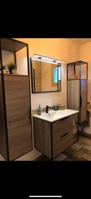 a bathroom with a sink and a mirror at Chambre d hôtes chez l habitant in Velaux