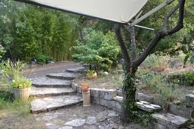 a bedroom with a bed and a window at Une Chambre aux Gabions in Cavaillon