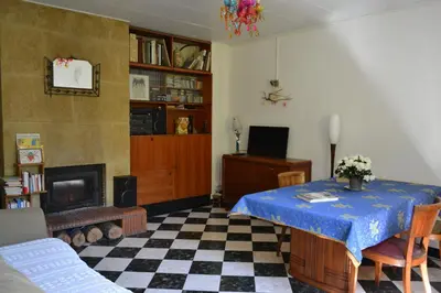 a bathroom with a sink and a washing machine at Une Chambre aux Gabions in Cavaillon