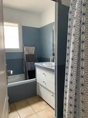 a bathroom with a sink and a tub and a shower at Maison de Vacances en Provence in Venasque