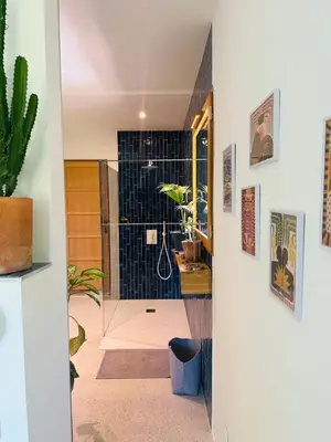 a bathroom with a shower with a glass door at House with swimming pool and breathtaking views of the Luberon in Robion en Luberon