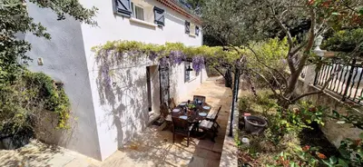 an overhead view of a patio with a table and chairs at Villa Provençale Harmonie 8 Guest poolhouse in Lambesc