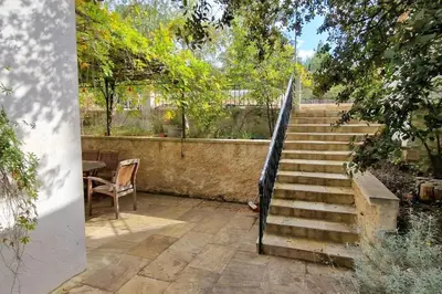 a set of stairs leading up to a house at Villa Provençale Harmonie 8 Guest poolhouse in Lambesc