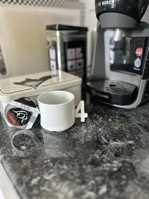 a coffee cup sitting on top of a counter at Appartement spacieux en Provence in Châteaurenard